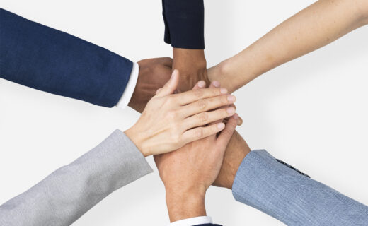 Diverse hands united business teamwork gesture